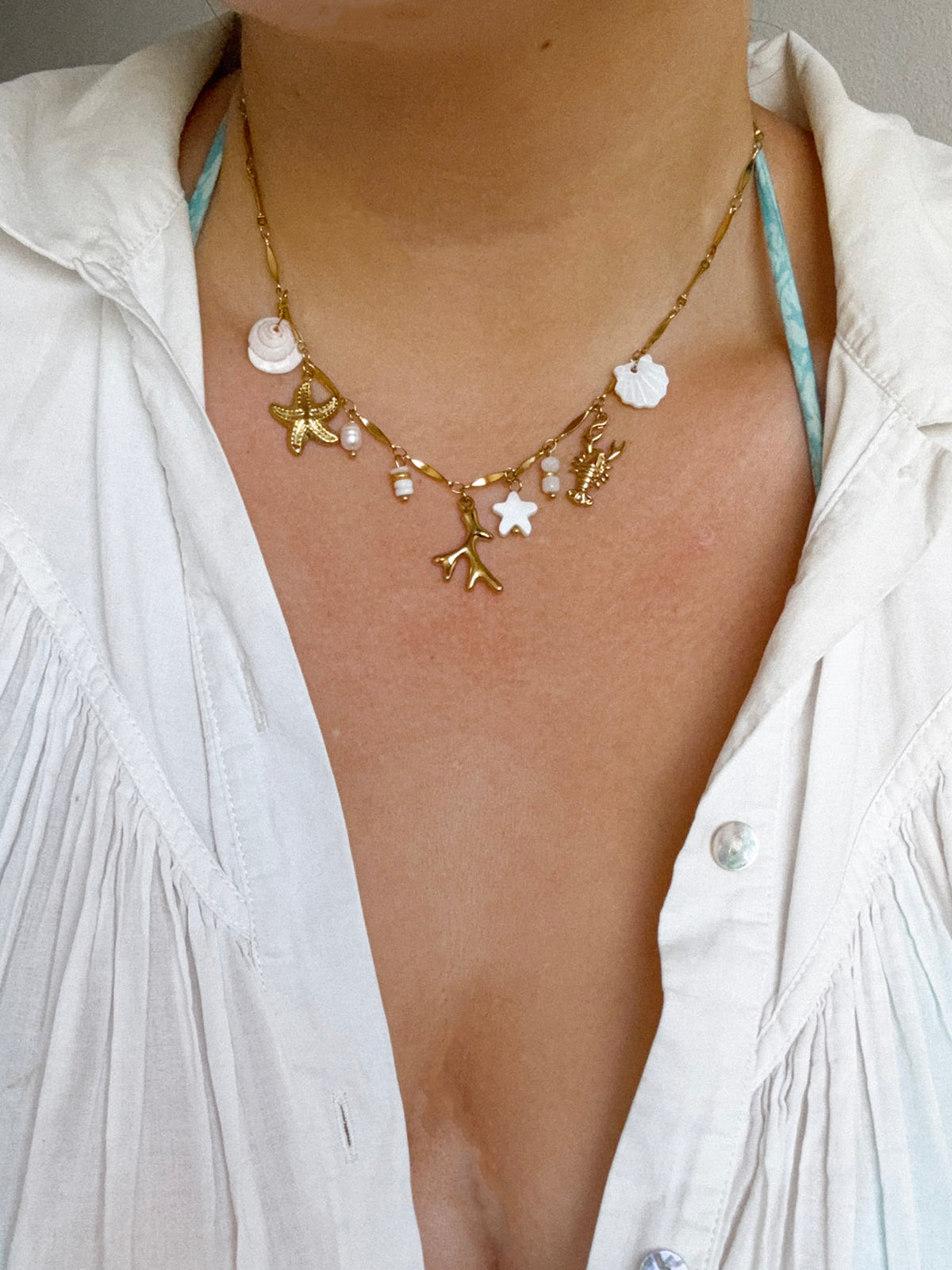 CORAIL - collier multicharms blanco